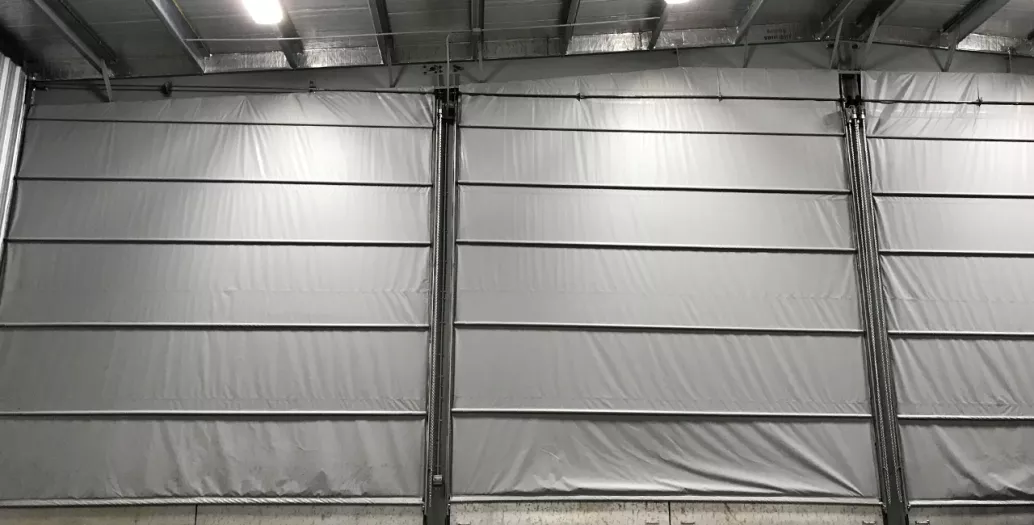 Dome with insulated roll up door